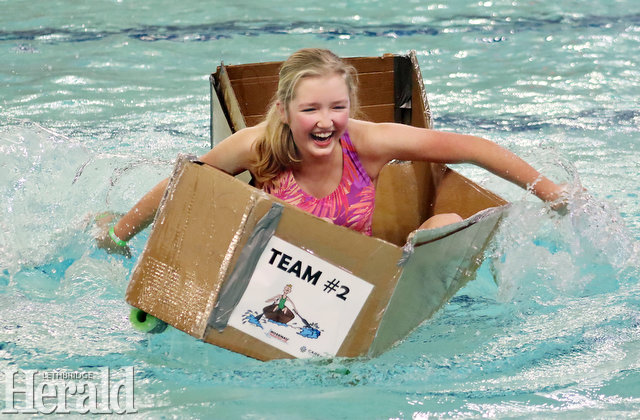Cardboard boats test student's ingenuity